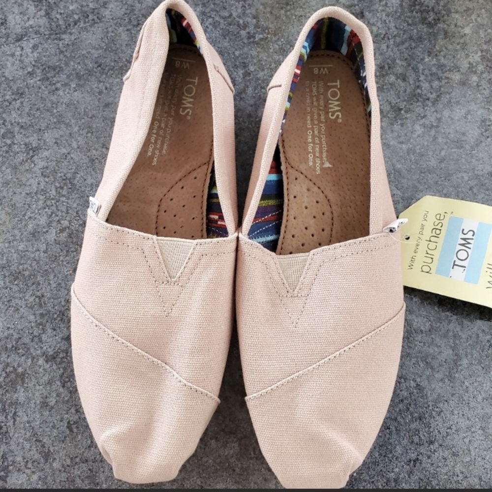 Cream/Tan Women’s Toms.